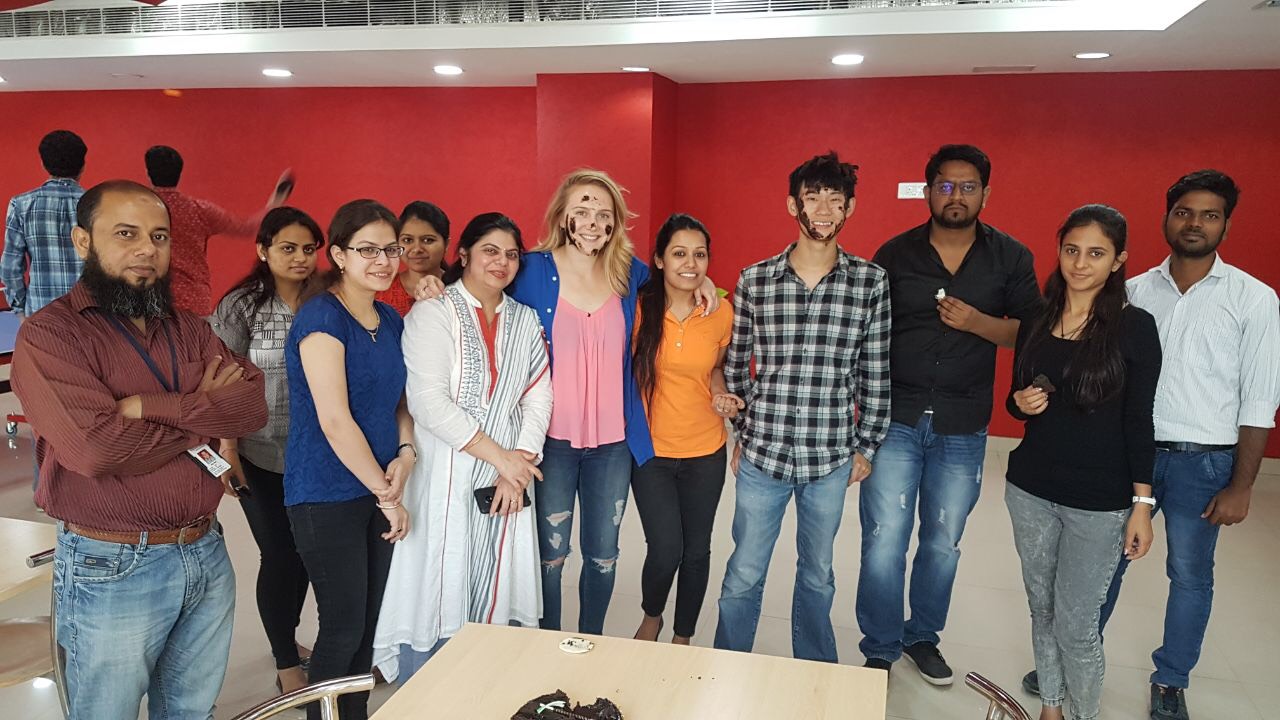The-author-with-Noida-employees-observing-a-fun-local-custom Behind The Scenes at Optimus: My Experience as an Intern
