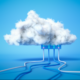 Cloud with cables running along the ground and plugged into it